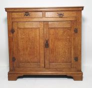 Early 20th century oak sideboard, the rectangular top with moulded edge above two drawers and two