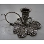 Georgian silver chamber taperstick with floral and foliate chasing within scrolls, scroll handle,