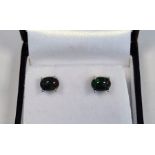 Pair of  black Ethiopian opal studs, boxedCondition ReportThe white metal is 925 silver. There is