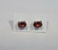 Pair of pink tourmaline studs, in silver