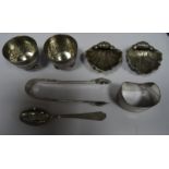 Pair of Victorian silver salts, of circular form, engraved decoration, and raised on ball feet (