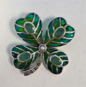 Four leaf clover brooch set with emeralds, seed pearl and marcasites and inlaid with enamel