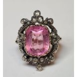19th-century gold-coloured and white metal ring, set with a central cushion-cut pink tourmaline,