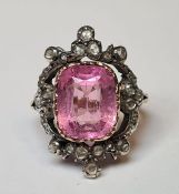 19th-century gold-coloured and white metal ring, set with a central cushion-cut pink tourmaline,