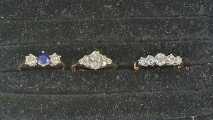 14ct gold, blue stone and cubic zirconia three-stone ring set central blue stone flanked by two