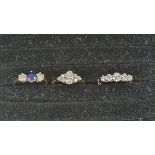 14ct gold, blue stone and cubic zirconia three-stone ring set central blue stone flanked by two