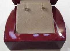 Pair of 18ct white gold solitaire diamond stud earrings, each approx 0.17ct