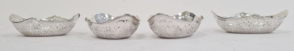 Set of four George V silver and pierced oval bonbon dishes, Birmingham 1918, William Hutton &