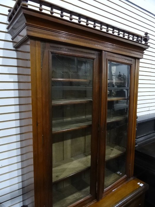 Edwardian walnut bookcase with two glazed doors enclosing shelves, above two drawers and two - Image 4 of 4