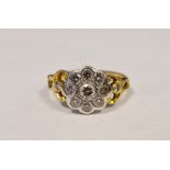 18ct gold and diamond cluster ring, flowerhead-pattern with one diamond to centre and surround of