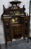 Late Victorian/early Edwardian glazed display cabinet with multi-mirror panel back above the