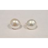 Pair of cultured pearl and gold post earrings Condition ReportOne of the pearls is approx 1.1 cm x