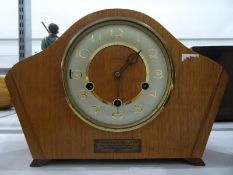 Modern quartz mantel clock with visible movement, a small Kundo anniversary clock and two other