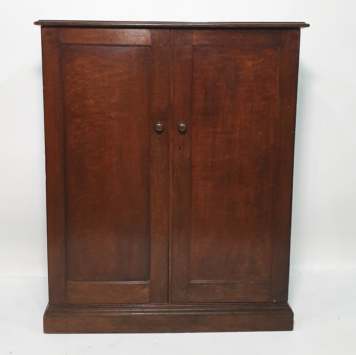 20th century oak two-door cupboard on plinth base, 107cm x 130cm  Condition ReportThe depth of the