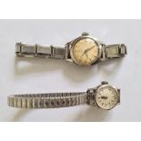 Lady's Omega stainless steel wristwatch with faceted bezel and a lady's Omega stainless steel