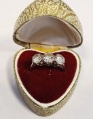 White metal diamond three-stone ring, set with three round brilliant-cut diamonds (estimated