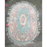 Chinese superwash oval rug, 150cm x 92cm