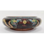Chinese cloisonne enamel bowl with inverted rim, black ground and decorated inside and out with