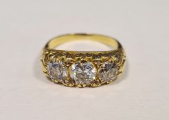 Victorian gold-coloured graduated diamond three-stone ring, with three old brilliant-cut diamonds (