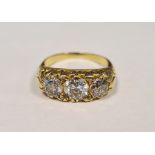 Victorian gold-coloured graduated diamond three-stone ring, with three old brilliant-cut diamonds (