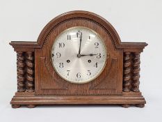 20th century oak-cased mantel clock with Arabic numerals to the steel dial, marked 'Made in