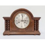 20th century oak-cased mantel clock with Arabic numerals to the steel dial, marked 'Made in