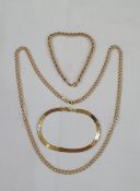 9ct gold double-curb link chain necklace, a 9ct gold rope-pattern chain bracelet and a 10K gold