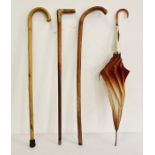 Horn-handled walking stick, 2 others and an umbrella (4)