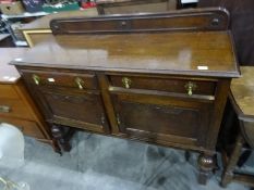 20th century oak sideboard with moulded beaded and galleried back, rectangular top with moulded edge