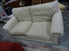 Two-seater sofa in oatmeal upholstery