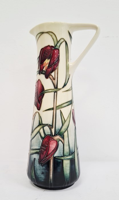 Moorcroft ewer, cream ground with pink fritillary, signed ‘Philip Gibson 2001’, 24cm high