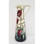 Moorcroft ewer, cream ground with pink fritillary, signed ‘Philip Gibson 2001’, 24cm high