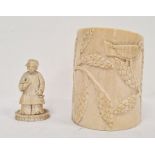 Early 20th century Chinese carved ivory chess piece figure, 6.5cm and an early 20th century