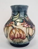 Moorcroft vase of baluster form, cream ground with pink flowers with green leaves, initialled ‘