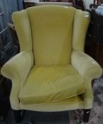 Early 20th century wingback armchair in yellow upholstery