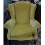 Early 20th century wingback armchair in yellow upholstery