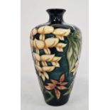 Moorcroft vase, green leaf and white flower decoration, initialled ‘M.C.C.’ and dated 98, 19cm high