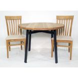 Circular breakfast table and two chairs (3)