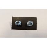 Pair of blue topaz studs, in silver