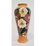 Moorcroft vase by Emma Bossons, of inverted baluster form, white and red flowers, signed to base ‘