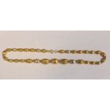 18ct gold and multi-colour graduated oval bead necklace, some beads ribbed and alternating with