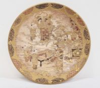 Japanese Satsuma earthenware plaque with figures at leisure pursuits, gilt and brocade border,