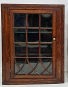 Oak wall-hanging corner display cabinet with astragal glazed door enclosing shelves, 88cm