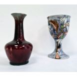 Cobridge glazed stoneware goblet painted with flowering branch, on a lilac ground, initialled