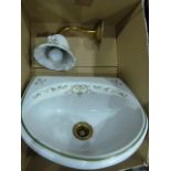 Edwardian-style ceramic basin, white with green foliate decoration and a matching wall lamp (2)