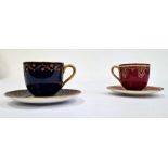 Two Royal Worcester demi-tasse and saucers, printed puce marks, date codes for 1929, the first