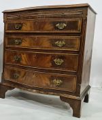 Reproduction mahogany serpentine-fronted bachelor's chest with moulded edge above brushing slide,