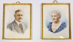 Pair Edwardian/1920's miniatures on ivory Head and shoulders portraits of husband and wife, 9.25