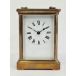 19th century brass four-glass carriage clock with enamel dial and Roman numerals
