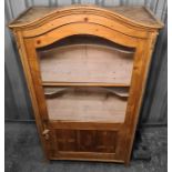 19th century continental display cabinet, the arched top above glazed and panelled door opening to